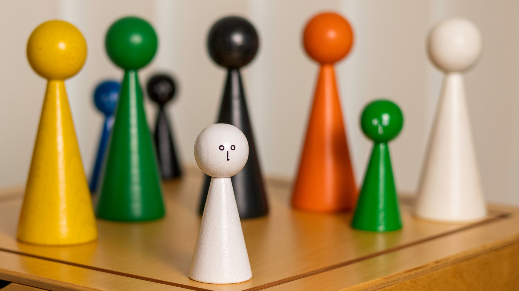 Constellation Board with colored figures  for the visualization of constellations and systems in coaching and psychotherapy.